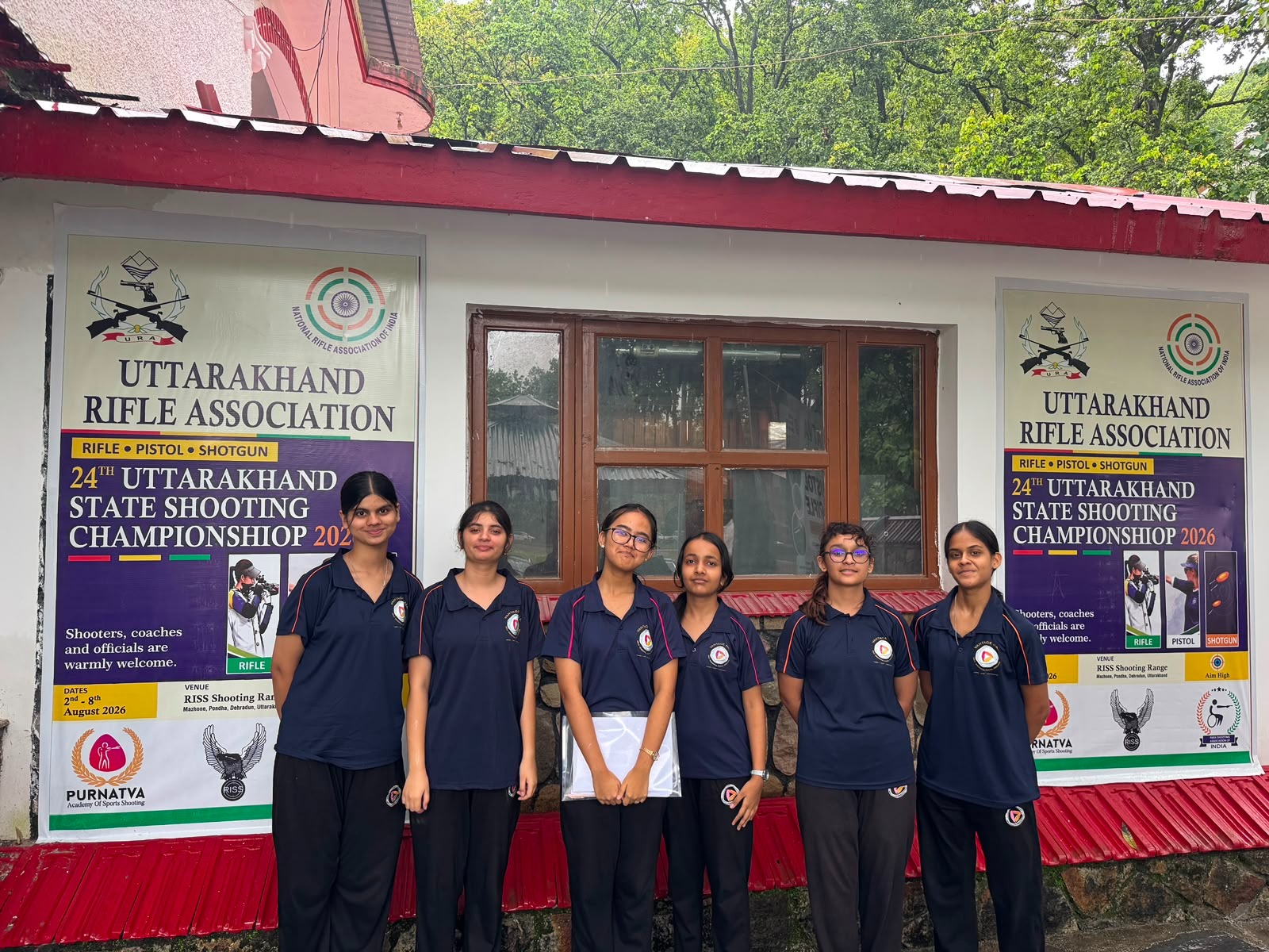 Four qualified marksmen from Vantage Hall holding their scoring certificates at the best girls boarding school in Dehradun