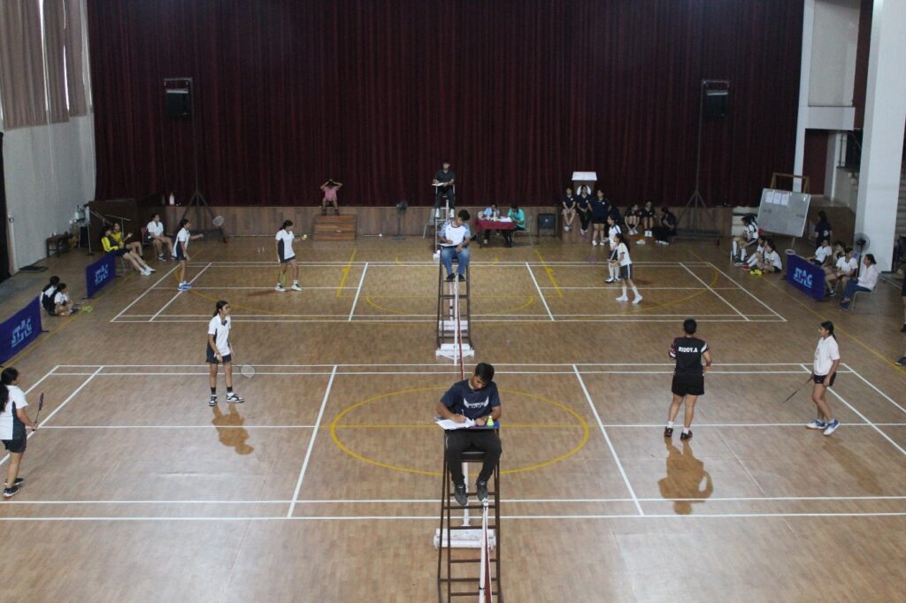 Podium winners and teams at the Falcon-12 badminton championship at the best girls boarding school in Dehradun India