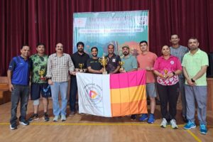 Vantage Hall staff team receiving the Men's Team Championship trophy at the Interstaff Badminton Tournament 2026 - best girls boarding school in Dehradun India