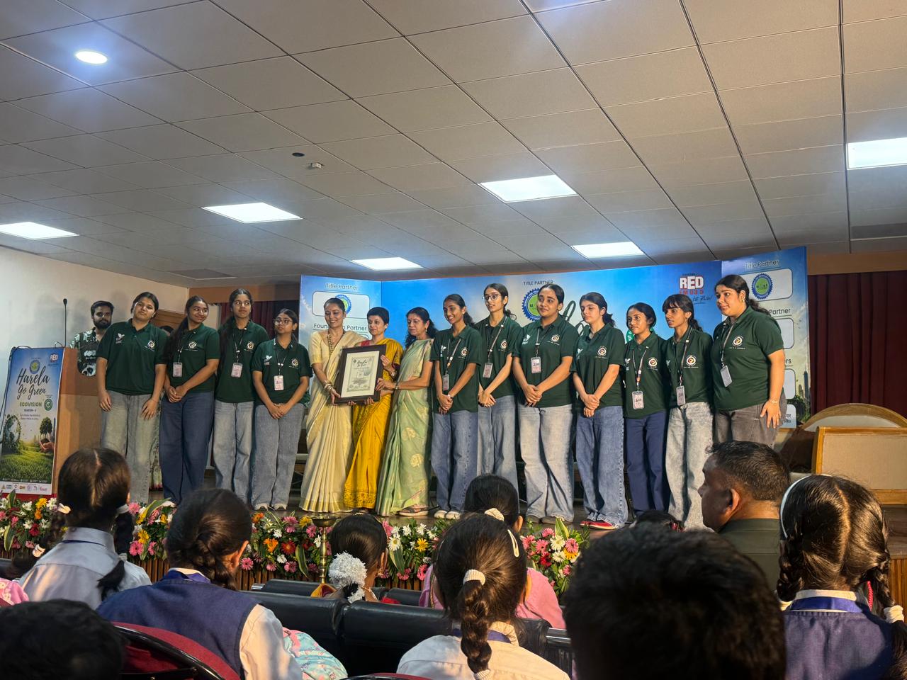 Vantage Hall Girls' Residential School students presenting the ECO Forge project to Cabinet Minister Satpal Maharaj at UCOST - best girls boarding school in Dehradun