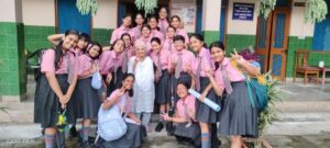 Grade 7 students from Vantage Hall interacting with senior citizens at Prem Dham Old Age Home - best girls boarding school in Dehradun India