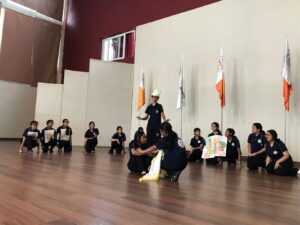 Grade 8 students performing a Nukkad Natak on healthy eating for National Nutrition Week at Vantage Hall - best girls boarding school in Dehradun India