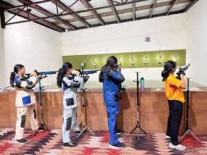 Phoenix House team celebrating their 1st place victory at the Inter-House Shooting Competition at Vantage Hall - best girls boarding school in Dehradun India
