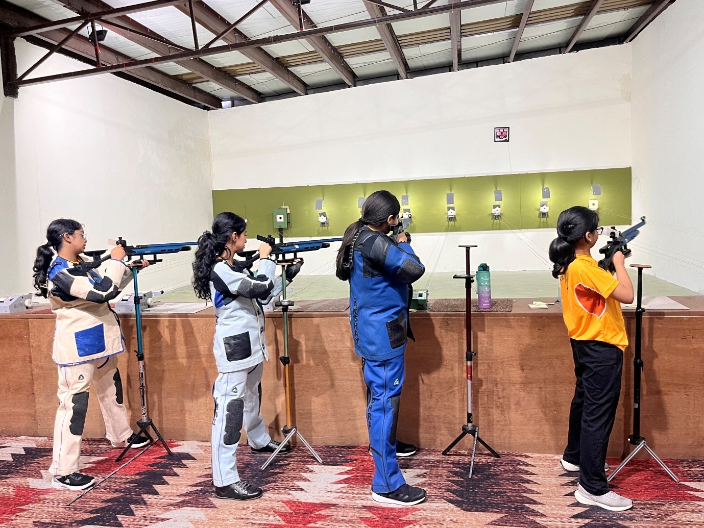 Phoenix House team celebrating their 1st place victory at the Inter-House Shooting Competition at Vantage Hall - best girls boarding school in Dehradun India