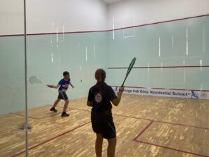 Student athletes from Vantage Hall and St. George's College competing during friendly squash matches - best girls boarding school in Dehradun