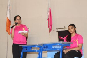 Student debaters presenting arguments during the Inter-House Hindi Debate Competition at Vantage Hall - best girls boarding school in Dehradun