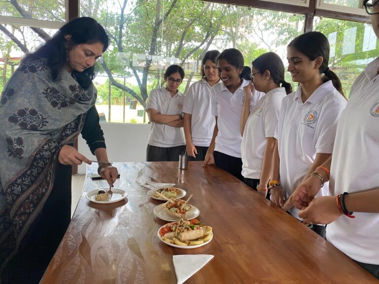 Students from Grades 9 to 12 preparing dishes during the Inter-Club Cooking Competition at Vantage Hall - best girls boarding school in Dehradun India