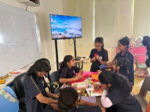 Students participating in Hindi Diwas essay writing and literary activities at Vantage Hall - best girls boarding school in Dehradun India
