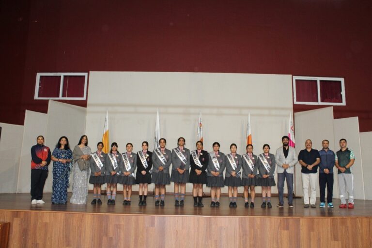 Newly inducted Sports Captains receiving their leadership badges during the Investiture Ceremony at Vantage Hall - best girls boarding school in Dehradun India
