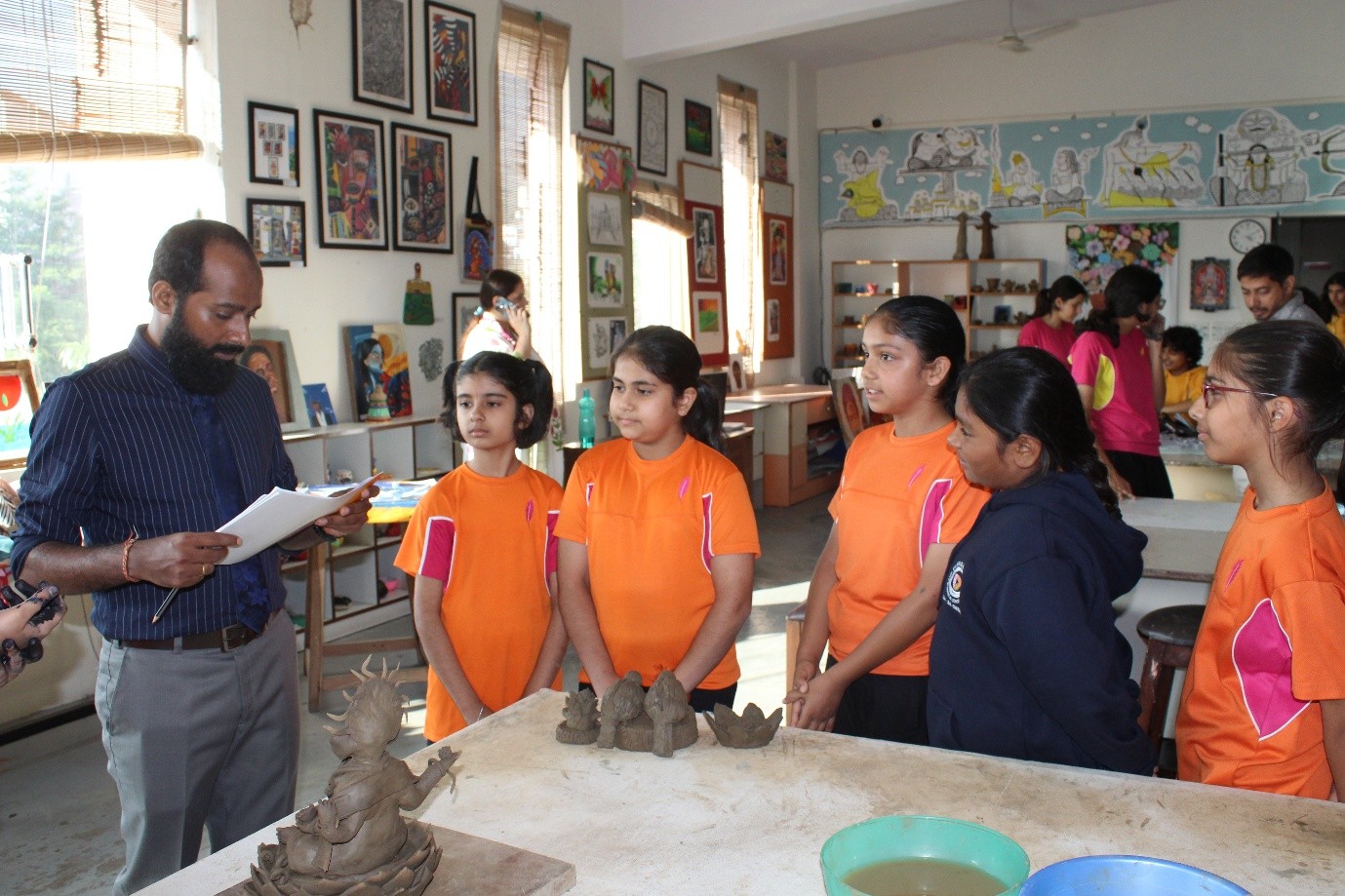 Students participating in canvas painting and pottery during the Inter-House Creative Arts Competition at Vantage Hall - best girls boarding school in Dehradun